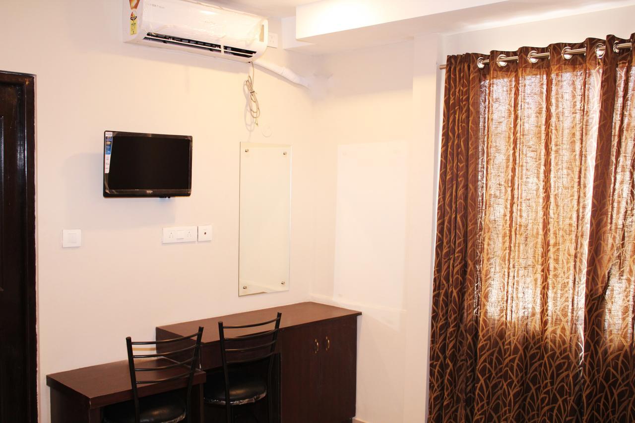 Collection O 8267 Galaxy Inn Kochi Eksteriør bilde